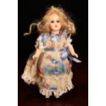 A Pintel & Godchaux (France) bisque head Bébé doll, the bisque head with inset fixed blue glass