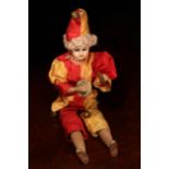 A Gebruder Knock (Germany) bisque head novelty 'automaton' type doll, in the form of a Jester, the