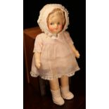 A 1930's/1940's cloth doll, attributed to Gerogene Averill (America), the cloth moulded face with