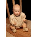 A Gebrüder Heubach (Germany) bisque head and jointed painted composition bodied character doll,