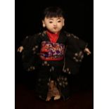 A Japanese gofun Ichimatsu traditional play doll, the gofun head head with inset fixed eyes and
