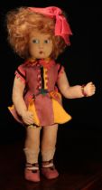 A 1930's Lenci (Italy) felt doll, the pressed felt head with painted features including black