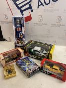 Set of Toys Including Model Cars and Pokemon Cards