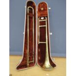 An Olos ambassador trombone in case. no mouth piece