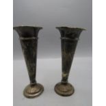 A pair silver hallmarked trumpet vases with weighted bases 14cmH some indentations