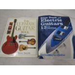 2 books relating to guitars