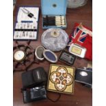 Collectables to include British Ensign flag, ships wheel clock, matchbox holder, Olympus trip