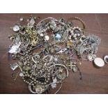 A quantity of costume jewellery 884grams with lots of silver.