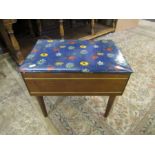 A sewing box with vinyl top