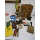 Collectors lot to include oil lamp, AA handbook, fishing weights and net, cigarette cases, Parker