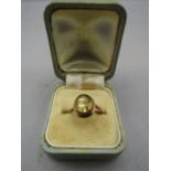 A gold ring stamped 9ct with yellow stone 2.24gms size k-l