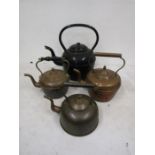 3 copper and one black enamel kettle