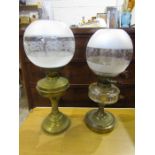 2 brass base oil lamps with etched globes