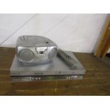 Panasonic DVD/CD/VHS player with remote and Technika portable CD/radio, both from a house