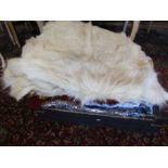 Animal skin rugs, scarves new in packets, rugs