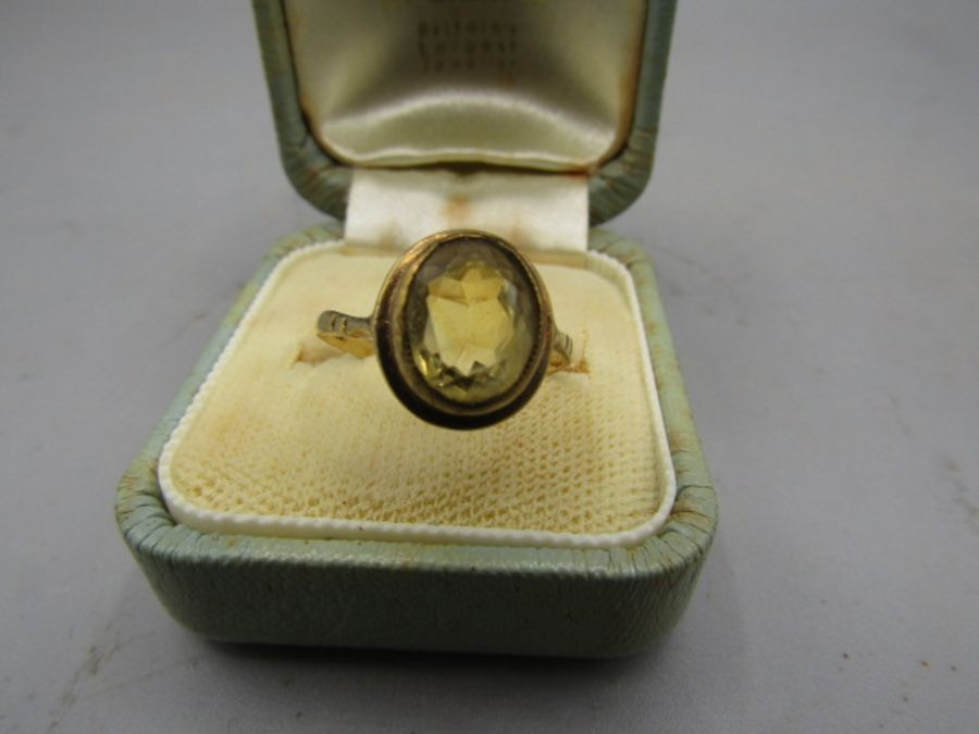 A gold ring stamped 9ct with yellow stone 2.24gms size k-l - Image 2 of 3
