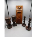 Pair treen owls, pair treen candlesticks and a treen brush holder with deer head