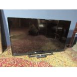 Toshiba 55" LCD TV with remote from a house clearance