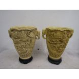 A pair Japanese vases - resin, with elephant handles and carved detail 30cm tall