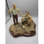 Border Fine Arts style figurine of two farmers and sheepdog sitting in raked hay on a wood plinth, M