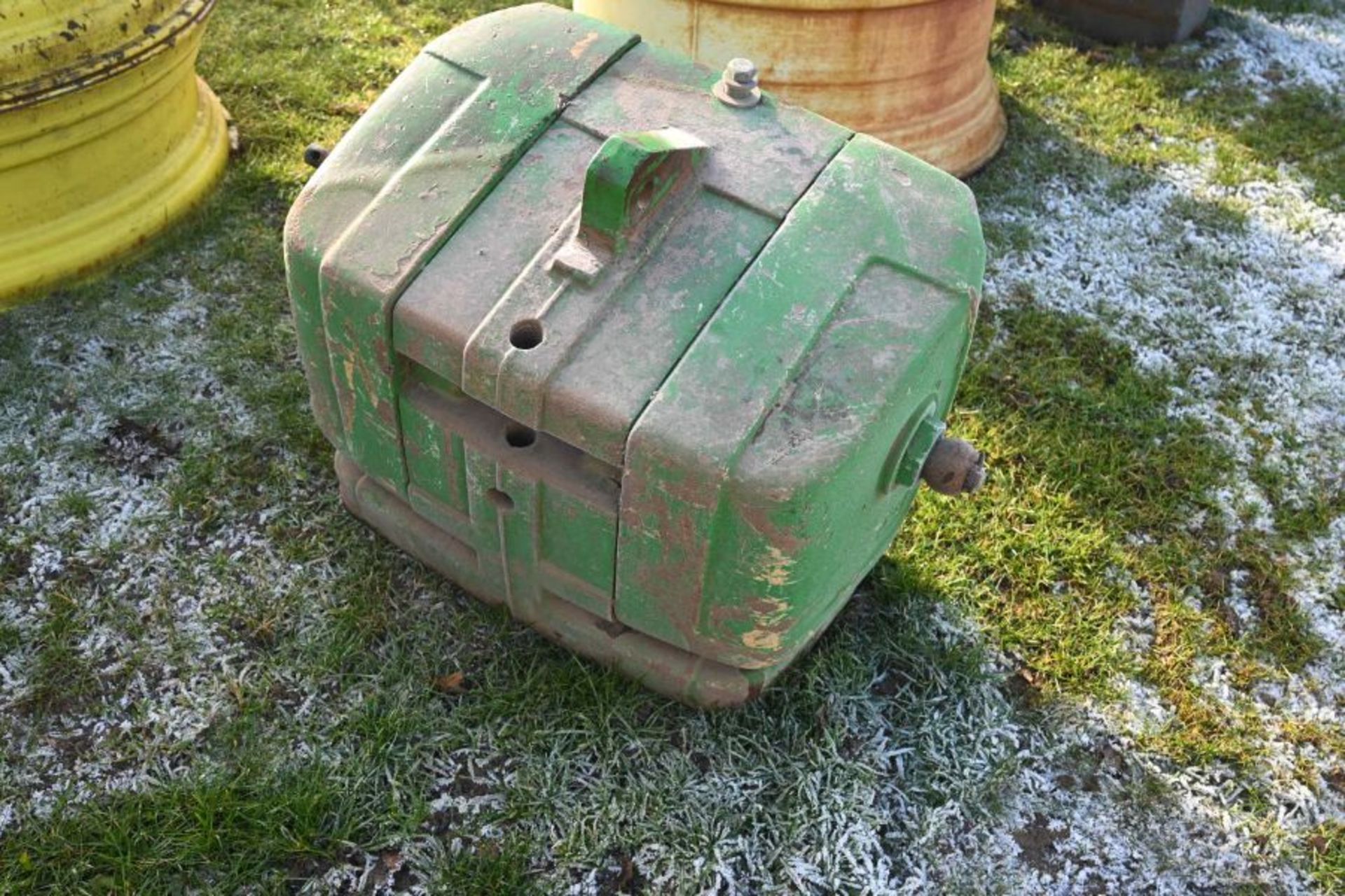 Front mounted tractor weight