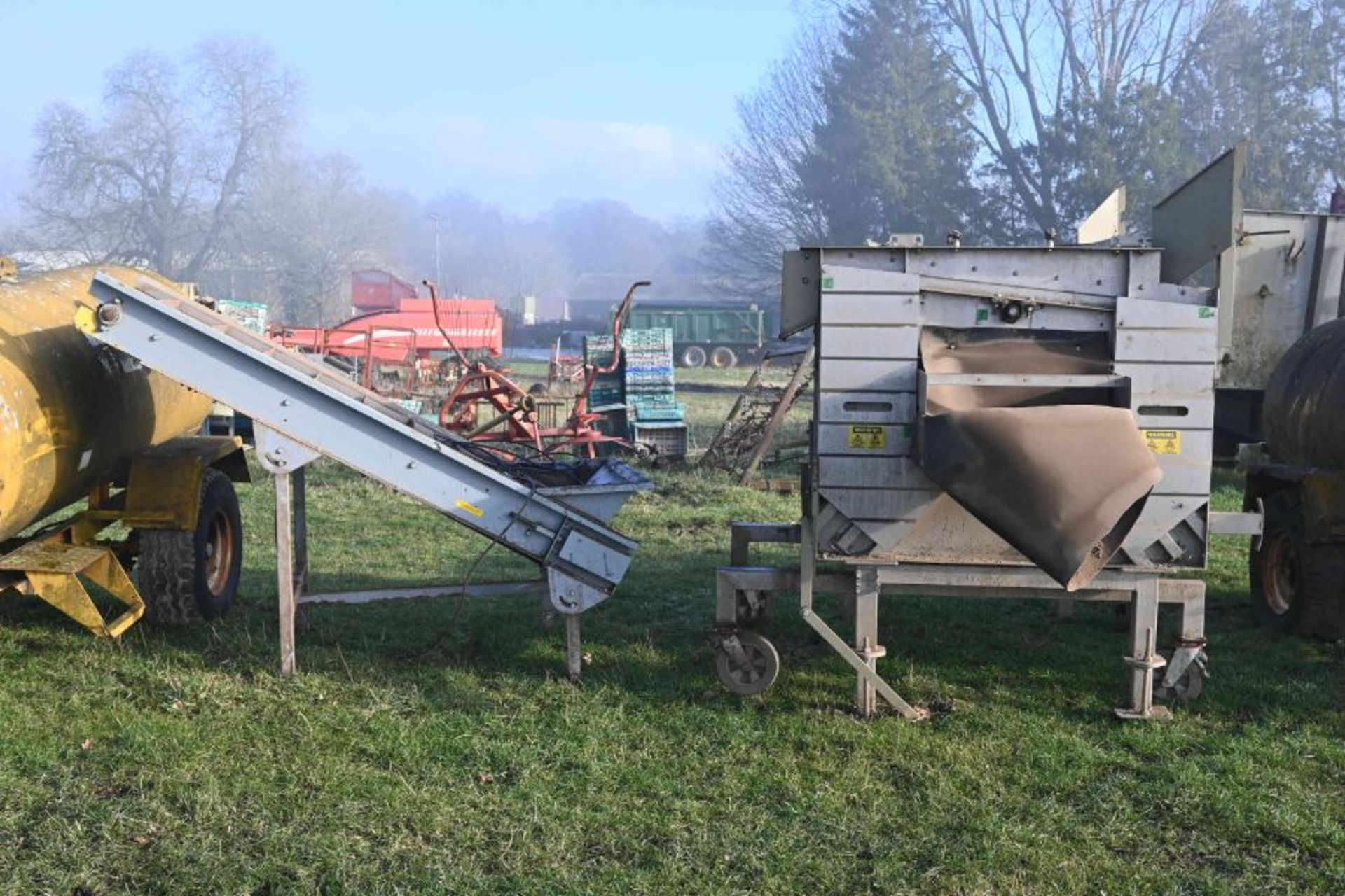 potato grader and elevator arm