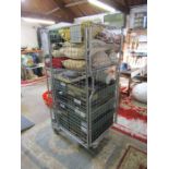 Stillage containing framed pictures, cushions and glassware etc