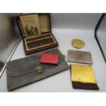 Cigarette cases, bead arithmatic, compact, Barclays bank wallet and empty autograph book