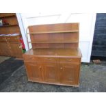 Mid century Priory dresser with 3 drawers, cupboard to base and plate racks above H131cm W122cm