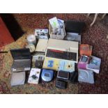 Collection of electronics including Acorn computer, Apple Ipod, Nintendo Wii and portable DVD player