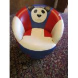 A kids leather swivel tub chair