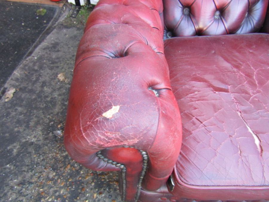 Pair of ox blood red leather button back wing armchairs (some damage to one chair as seen in - Image 4 of 6