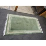 Green rug 90cm x 160cm approx