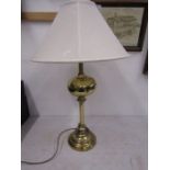 A brass based lamp