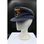 a reproduction Third Reich Luftwaffe EM/NCO'S M43 field cap