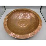 A Glasgow school? copper hammered bowl 33cm dia