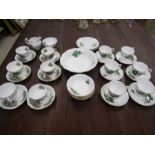 Staffordshire bone china part tea set and fruit set decorated with Lilley of the valley pattern on