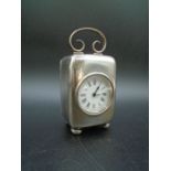 A Silver cased boudoir carriage clock - hallmarked Birmingham 1901 by Henry Williamson Ltd,