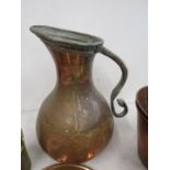 Large copper jug with iron work handle 35cmH