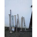 Garden tools including sledge hammer and pick axe