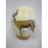 An ostrich egg with African painting