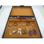 A collection of sterling silver rings (14) and 5 pairs of earings (925)