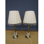 A pair brass based lamps