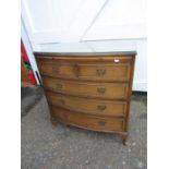 Walnut veneered 2 short over 3 long bow fronted chest of drawers with glass top and slide H83cm