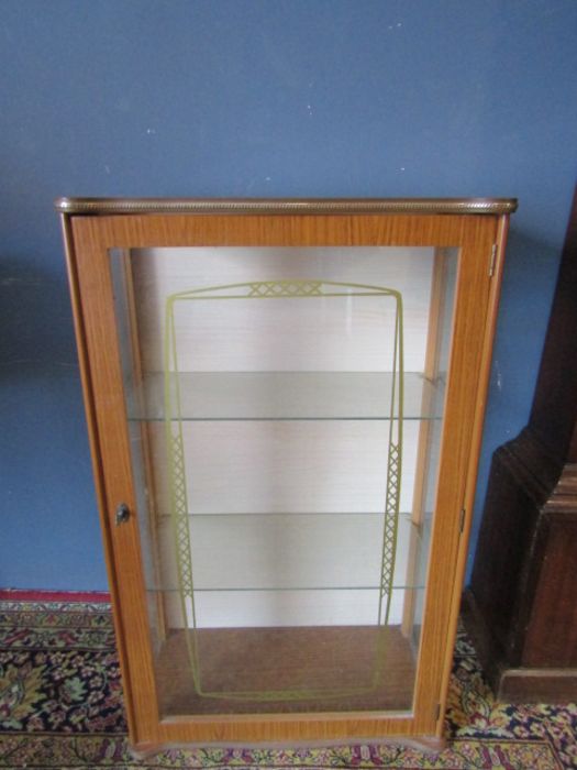 A retro glass display cabinet