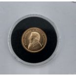 2018 Krugerrand 1/4oz gold, in case