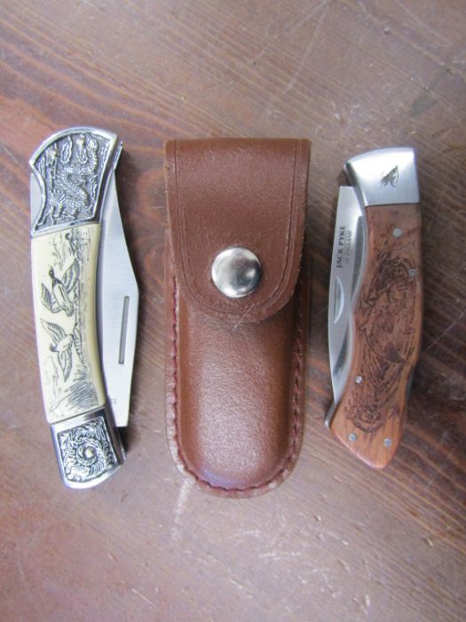 A Jack Pyke pocket knife with fishing scene and one other with duck scene
