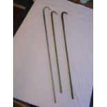 3 vintage glass frigger canes to incl a clear double coloured spiral twist cane, green moulded