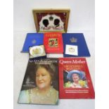 Royal commemorative books, a picture, a boxed dish and a tile
