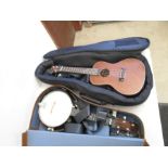 2 Ukuleles in cases including Lanikai